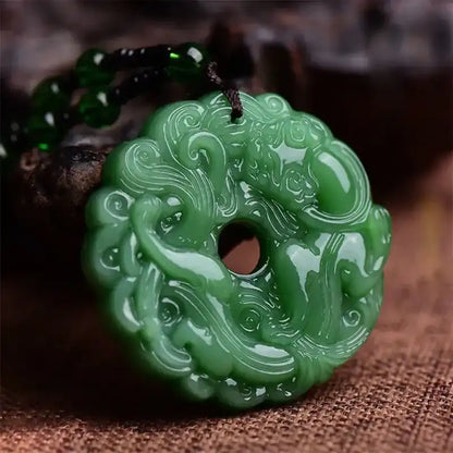 1pc Green Jade Hand-Carved Pixiu Dragon Pendant Necklace. In the East, Pixiu is a famous mythical creature believed to bring wealth. A protective and lucky amulet suitable for men and women.